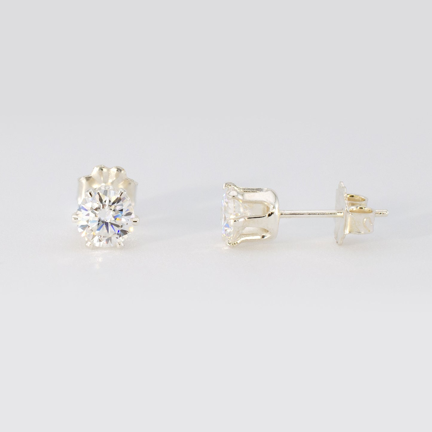 1.00 CTW (0.50ct Each) Round Moissanite Stud Earrings • Solid 925 Sterling Silver
