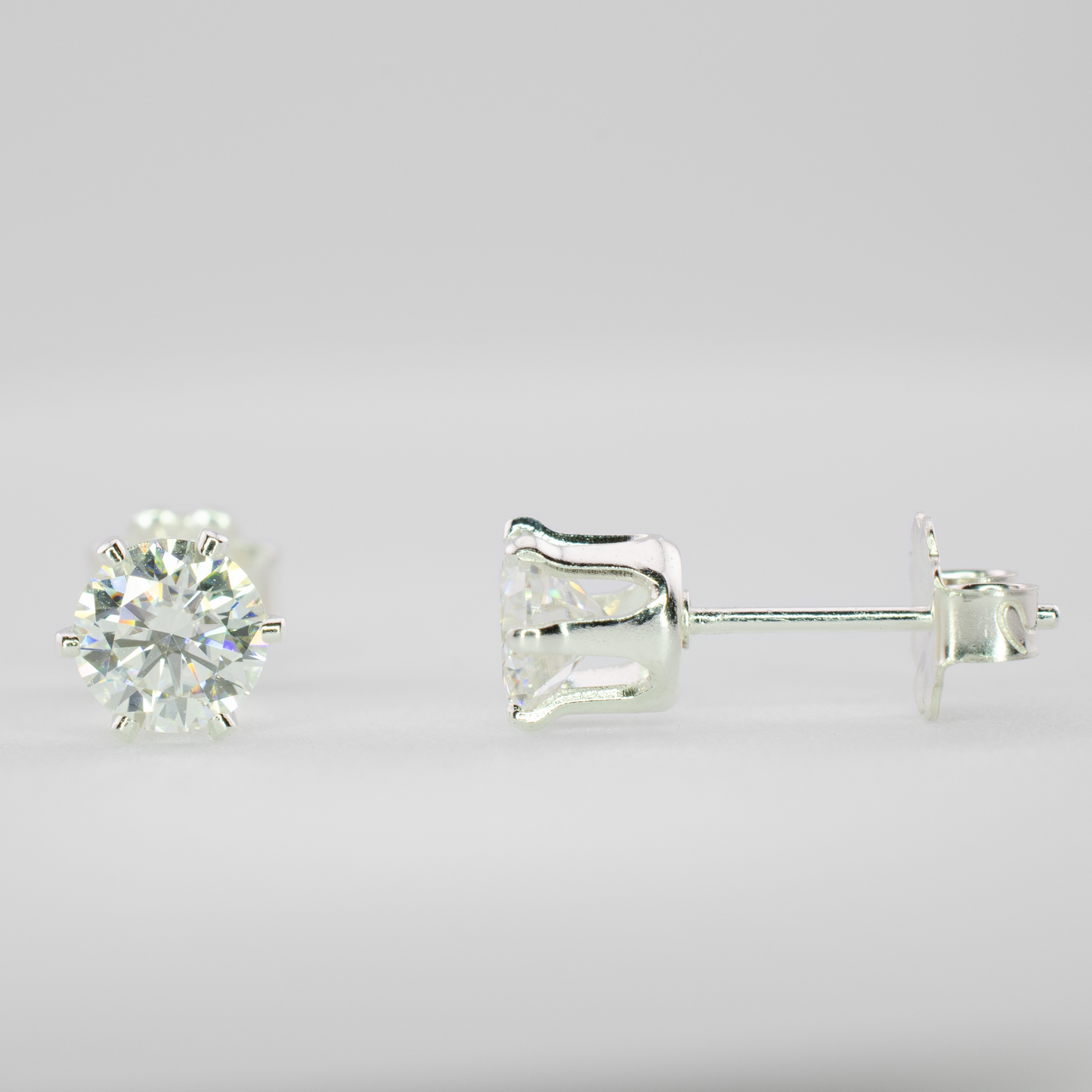 1.00 Carat (0.50 Each) Moissanite Stud Earrings • Solid 925 Sterling Silver