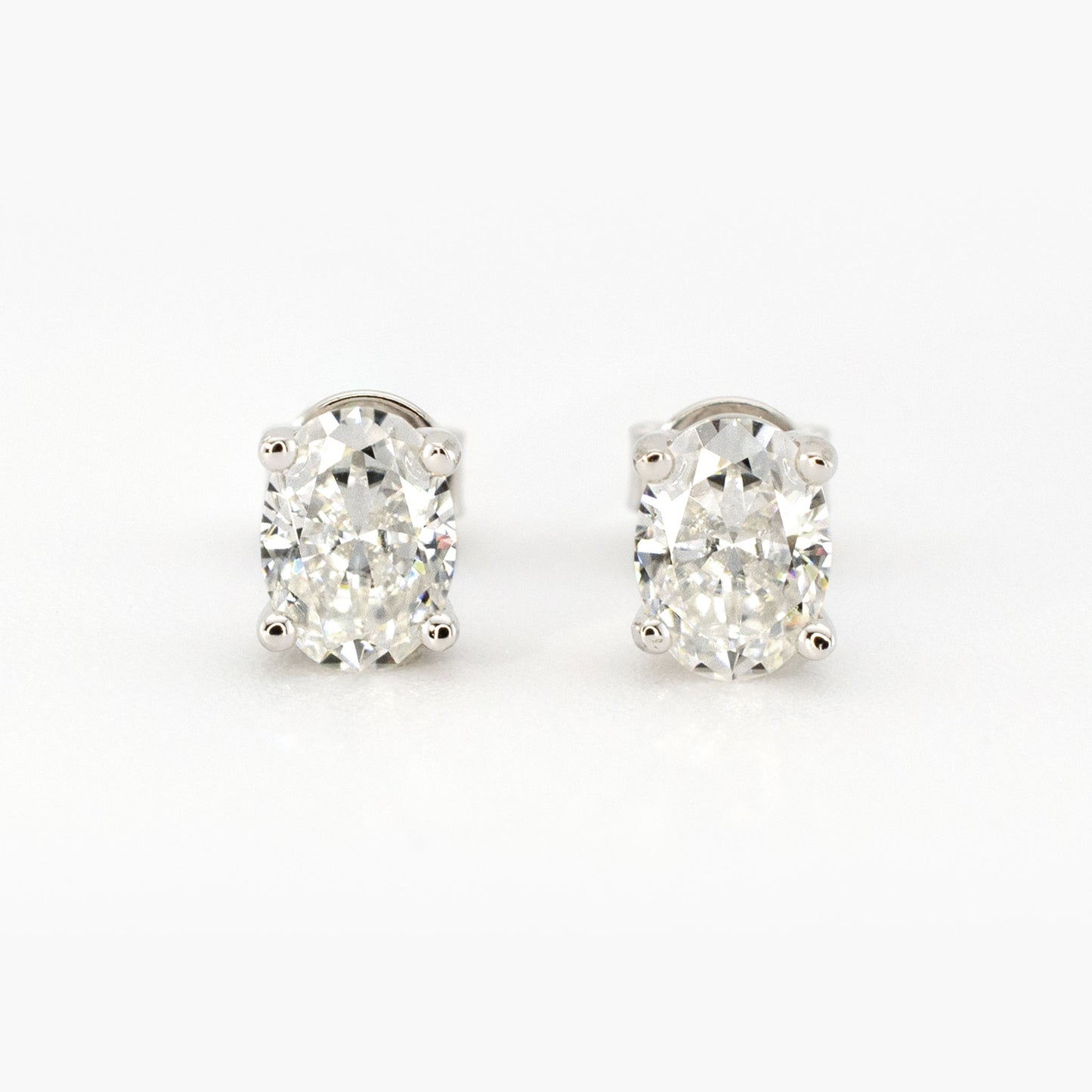 2ctw Oval Moissanite Stud Earrings (1ct Each) • 925 Sterling Silver