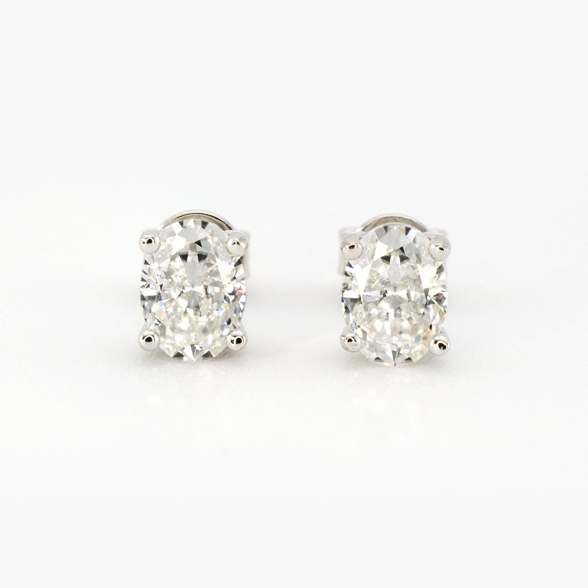 2ctw Oval Moissanite Stud Earrings (1ct Each) • 925 Sterling Silver