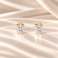 Front view of 1 CTW round moissanite stud earrings in six-prong 14/20 gold-filled settings.