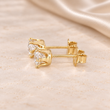 Side view of 1 CTW round moissanite stud earrings showing six-prong gold-filled baskets, posts and butterfly backs.