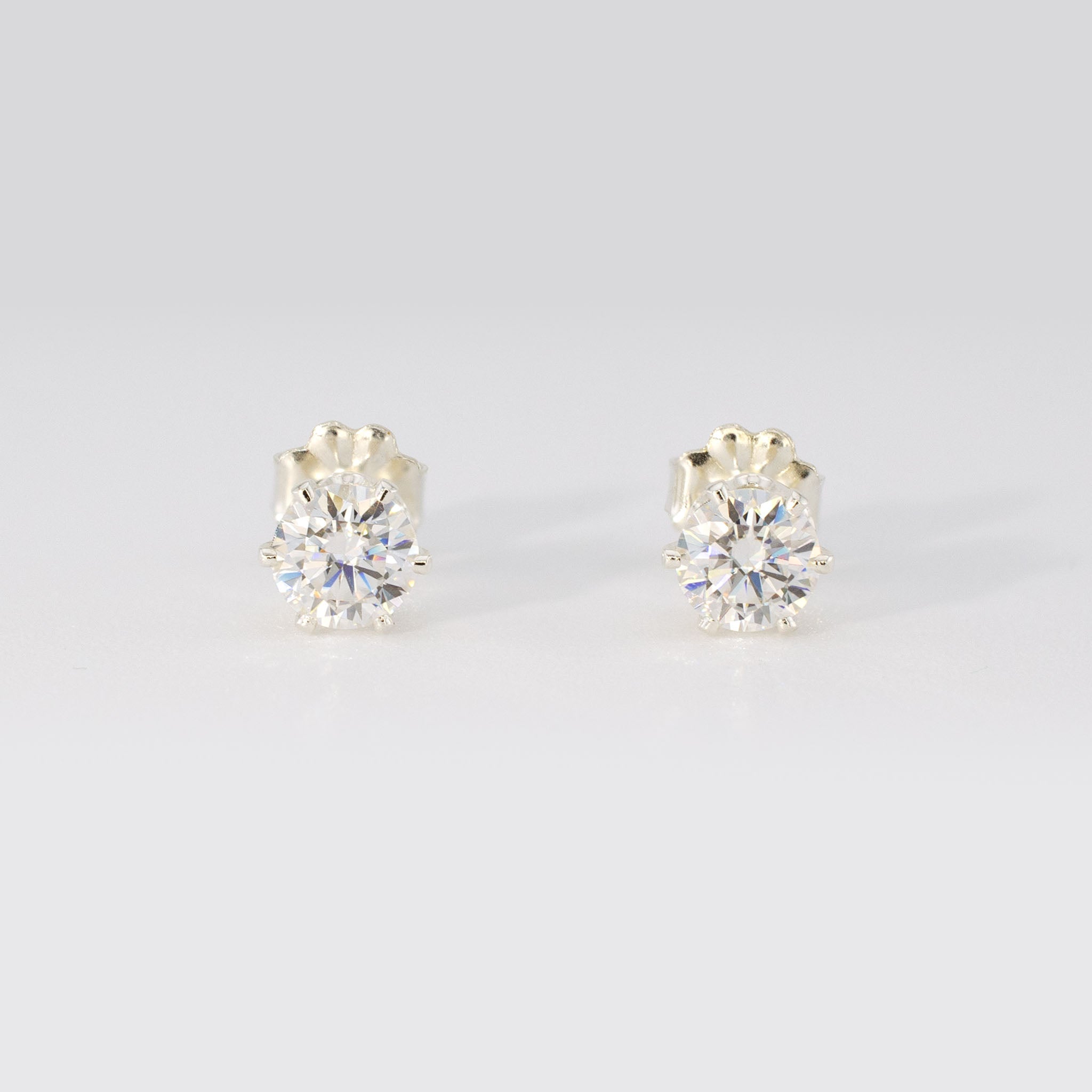 1.00 CTW (0.50ct Each) Round Moissanite Stud Earrings • Solid 925 Sterling Silver