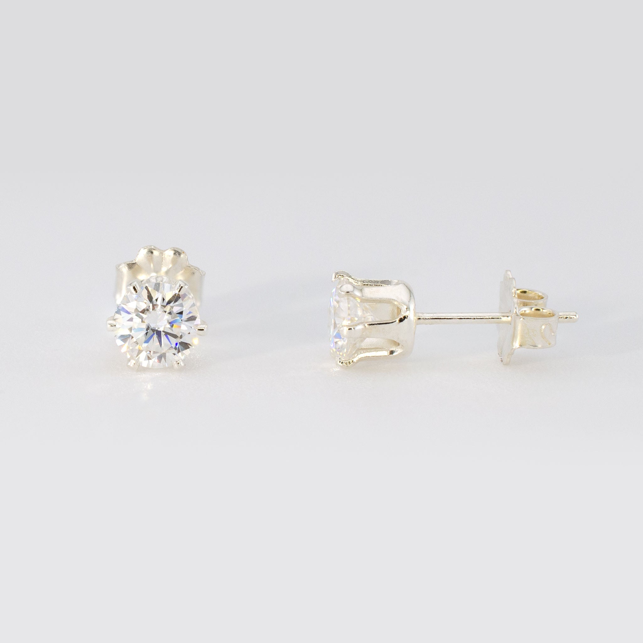 1.00 CTW (0.50ct Each) Round Moissanite Stud Earrings • Solid 925 Sterling Silver