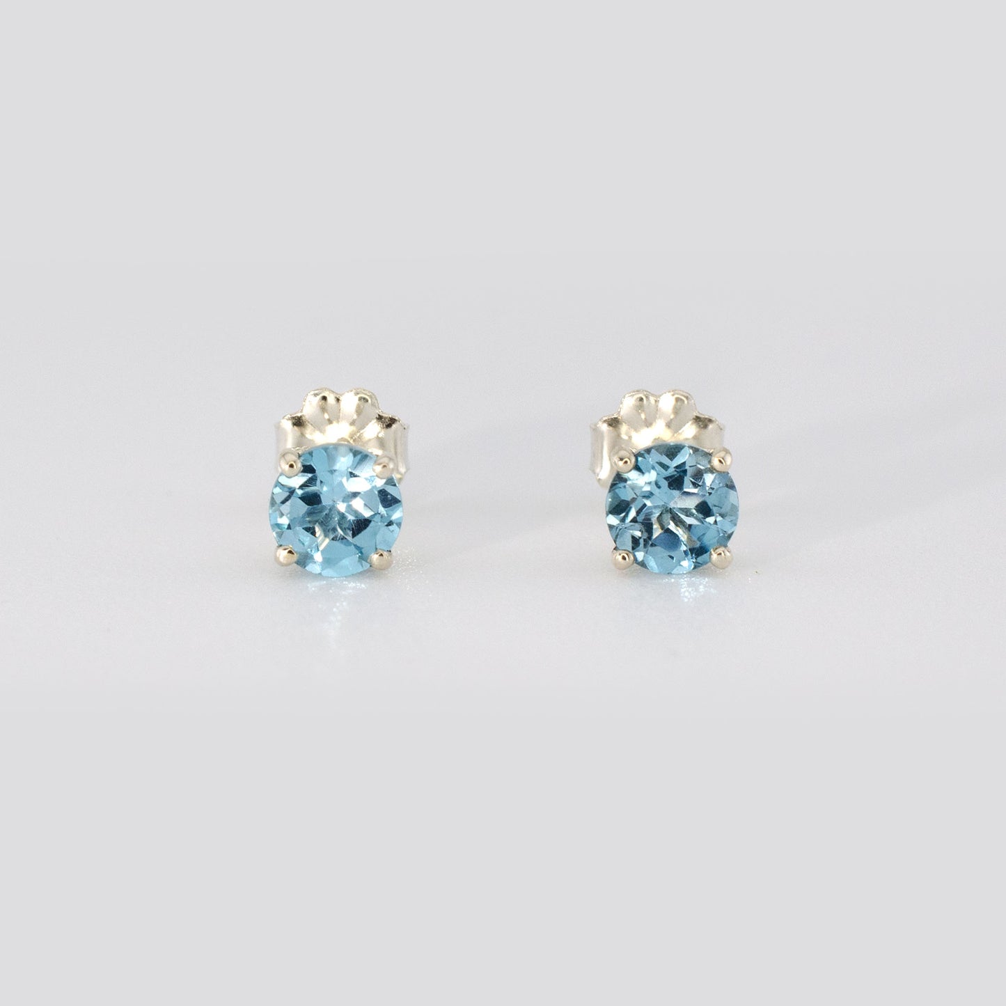 5mm Swiss Blue Topaz Stud Earrings • 925 Sterling Silver