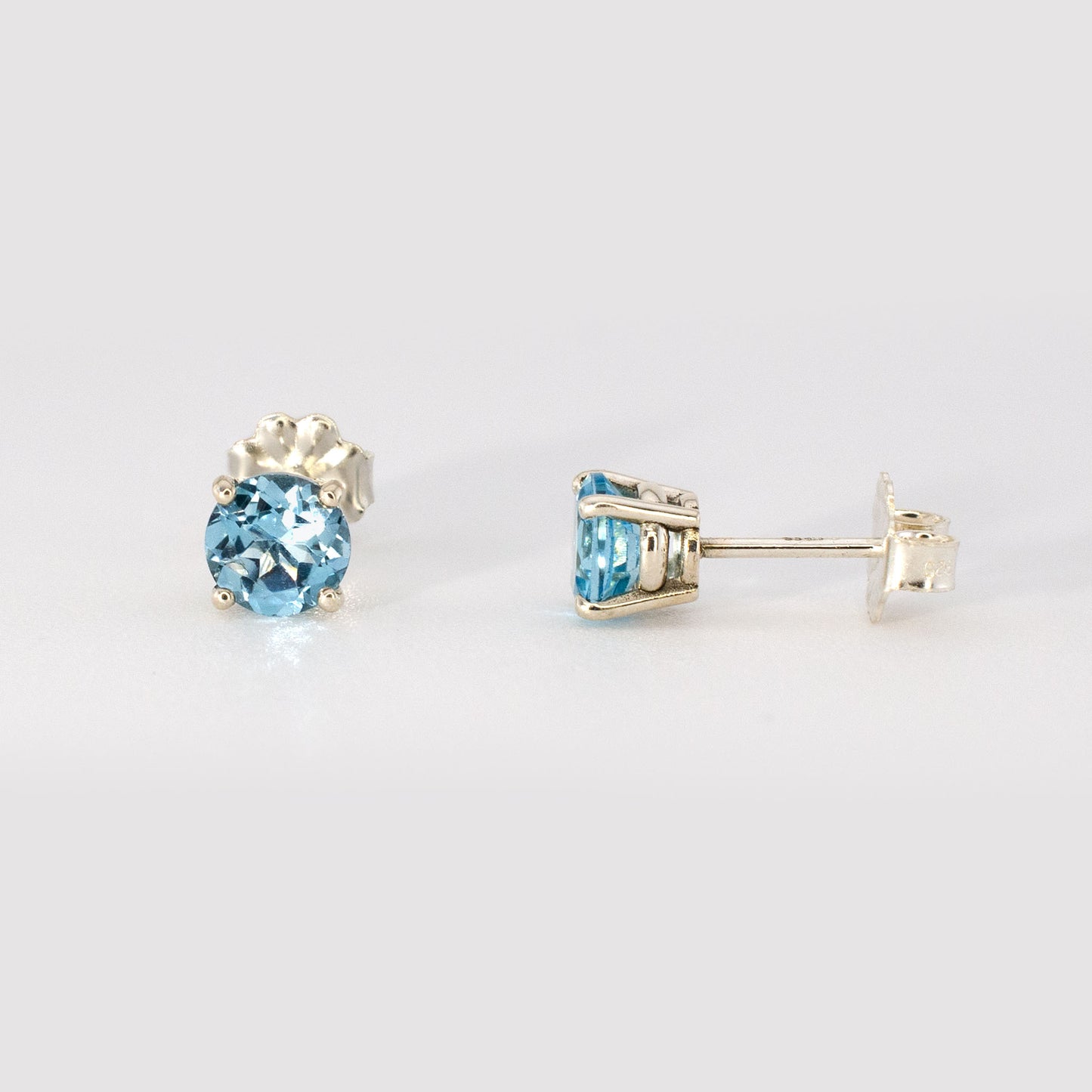 5mm Swiss Blue Topaz Stud Earrings • 925 Sterling Silver